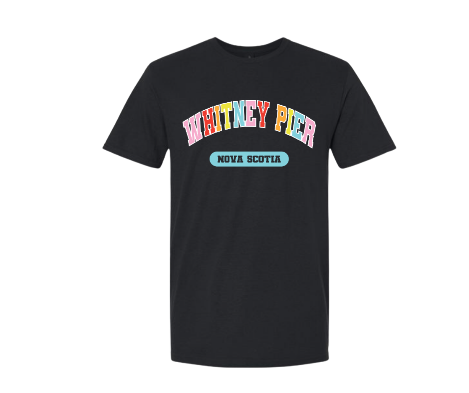 A black short-sleeve crewneck t-shirt featuring a colorful graphic on the chest that reads 'WHITNEY PIER' in rainbow-colored letters with 'NOVA SCOTIA' underneath in a light blue oval, displayed on a solid white background.