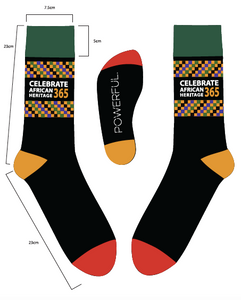 Mock up of sock that reads "Celebrate African Heritage 365" with Powerful logo on bottom. Red toes, yellow heel and green top.